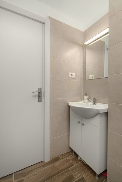 Parcul Teilor, Titan garsoniera